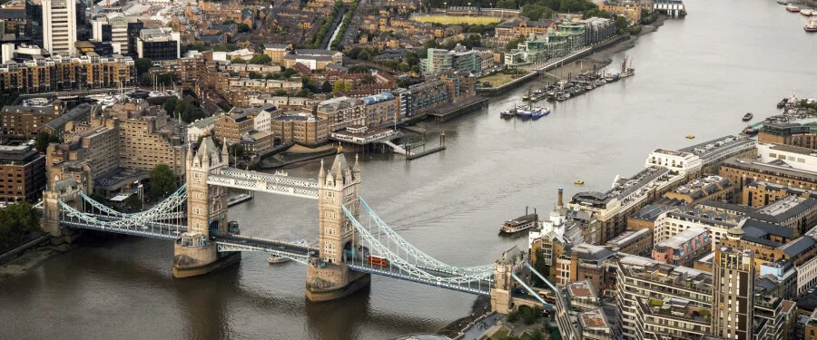 The Palace of Westminster, bridge and Union Jack in London.