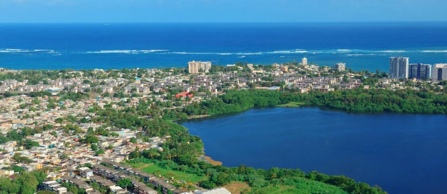 A tropical island harbour and cruise ship used for the Samoa company formation guide.